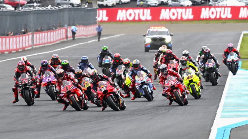 Pecco Bagnaia and Pedro Acosta fight for the lead at the start of the 2024 MotoGP Japanese GP