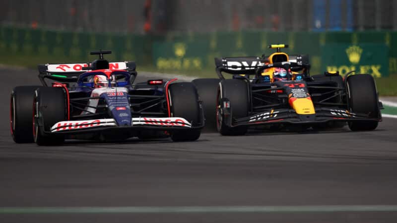 Sergio Perez battling with Liam Lawson at 2024 F1 Mexican Grand Prix