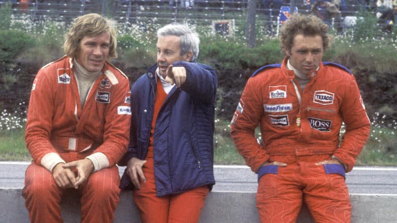 Teddy Mayer sits between McLaren F1 drivers James Hunt and Jochen Mass at the 1976 Swedish GP