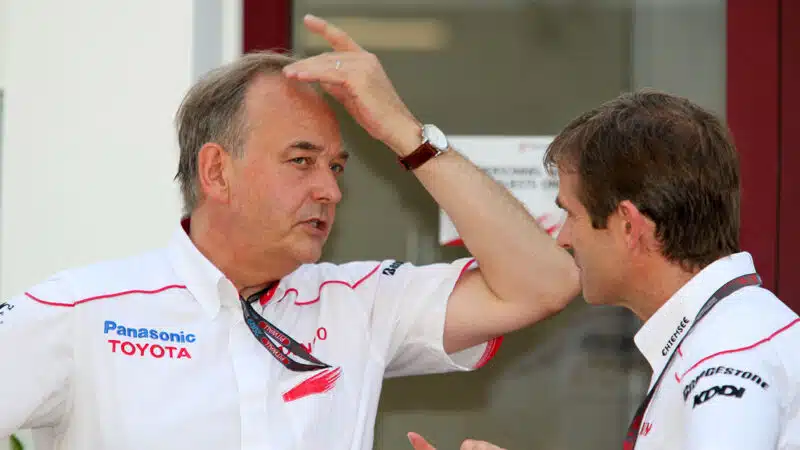 John Howett and technical director Pascal Vasselon before the 2009 F1 Singapore Grand Prix