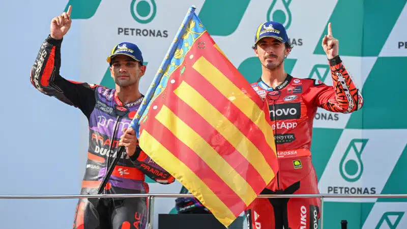 Jorge Martin and Pecco Bagnaia show support for victims of Valencia floods with Spanish flag on 2024 MotoGP Malaysian GP podium