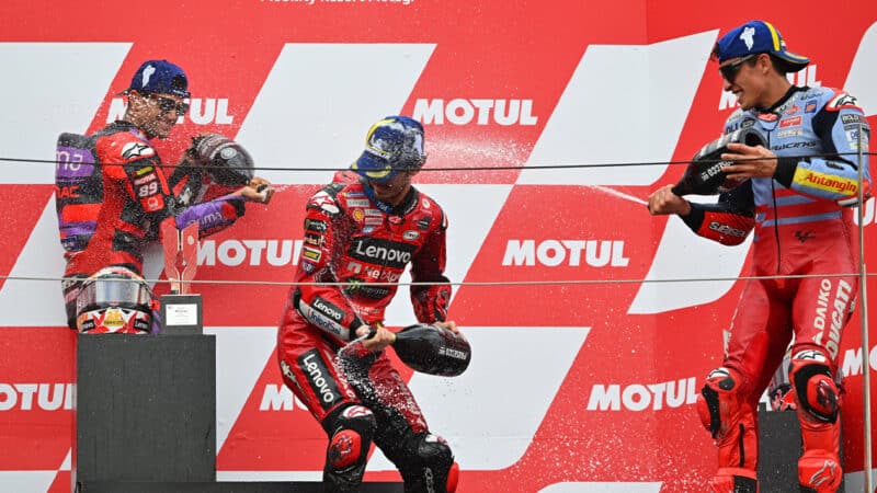 Marc Marquez with Pecco Bagnaia and Jorge Martin on MotoGP podium