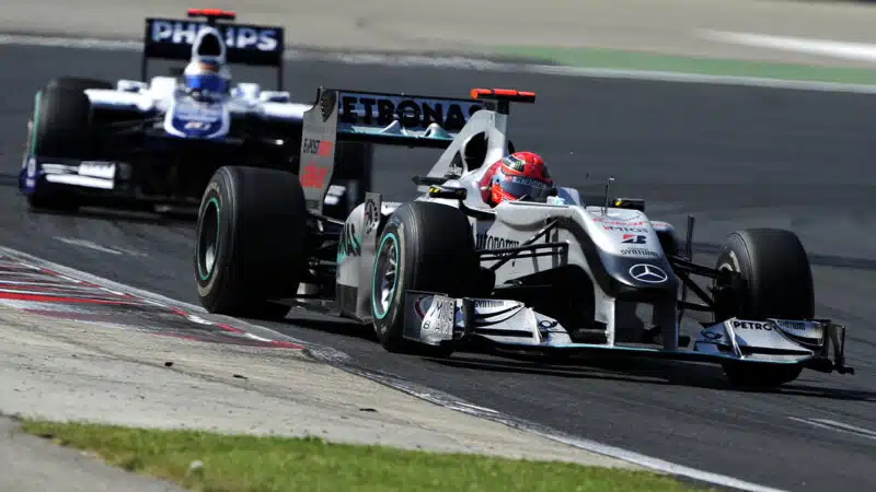 Mercedes of Michael Schumacher leads Rubens Barrichello Williams in 2010 F1 Hungarian Grand Prix