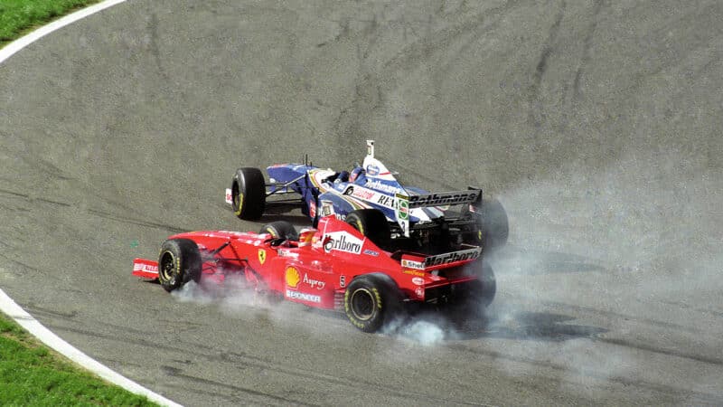 Michael Schumacher slides off the track at Jerez after driving into JAcques Villeneuve during 1997 F1 European Grand Prix