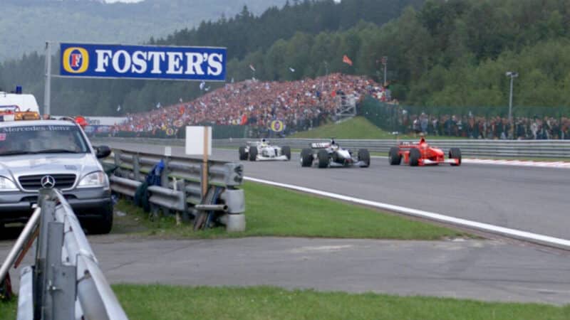 Mika Hakkinen passes Michael Schumacher and Ricardo Zonta in 2001 F1 Belgian Grand Prix