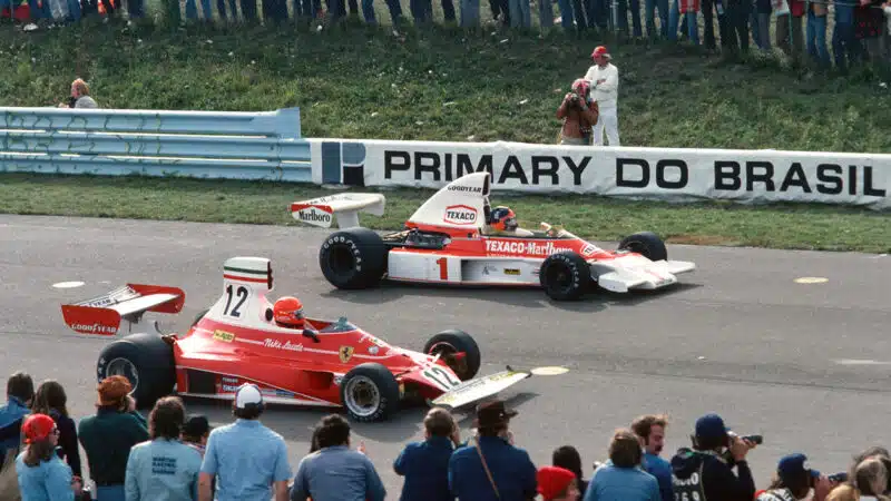 Emerson Fittipaldi alongside Niki Lauda on the grid in 1975 F1 US Grand Prix