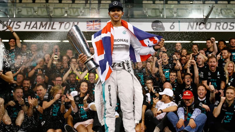 Lewis Hamilton with Mercedes F1 team after winning 2014 F1 world championship