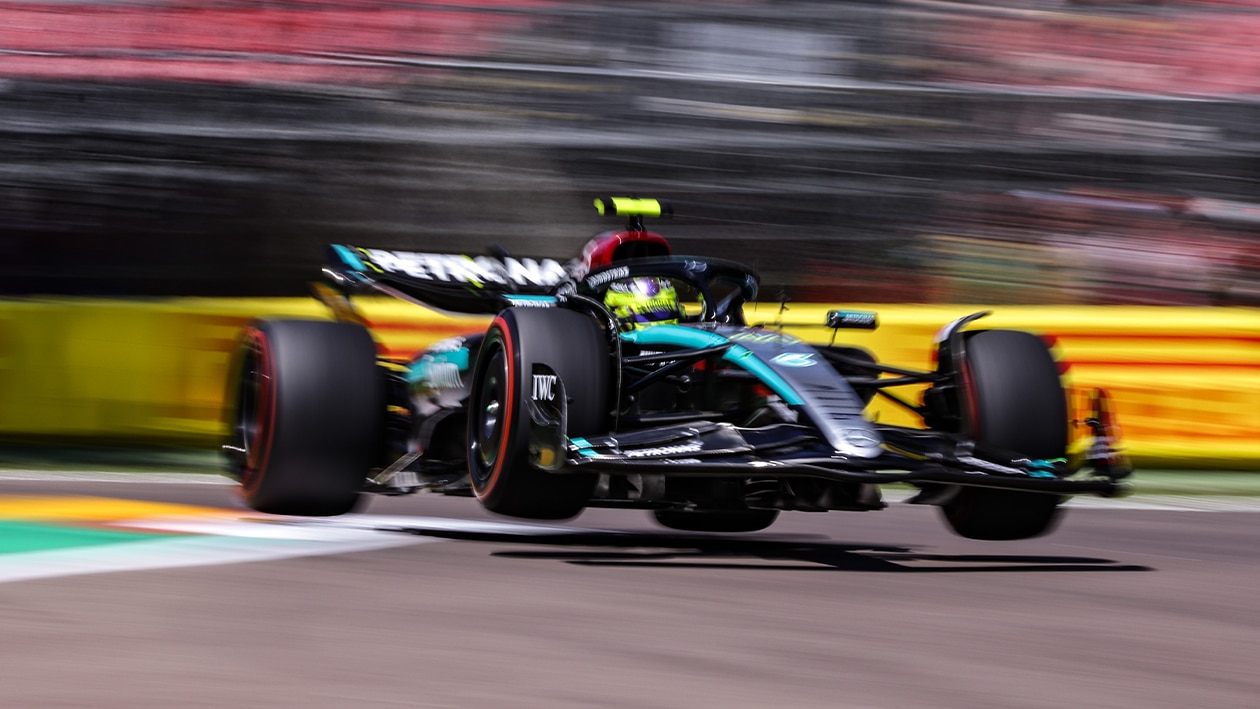 Mercedes of Lewis Hamilton in mid air over a kerb at 2024 f1 Emilia Romagna Grand Prix