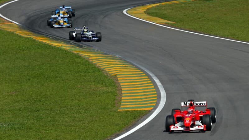 Michael Schumacher has an early lead for Ferrari in the 2002 F1 Brazilian Grand Prix