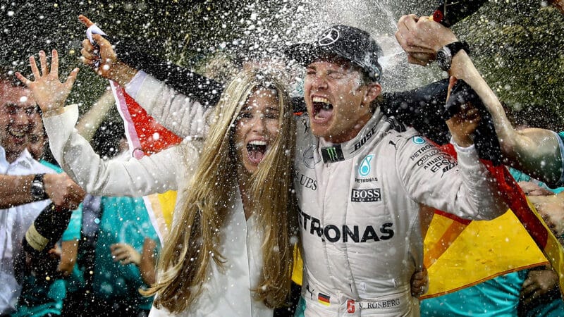 Nico Rosberg is sprayed with champagne as he celebrates winning the 2016 F1 world championship