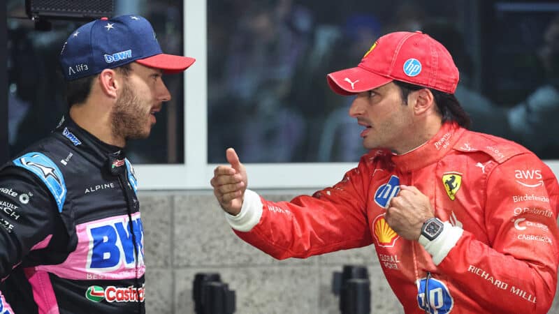 Carlos Sainz gestures as he talks to Pierre Gasly after 2024 F1 Las Vegas Grand Prix qualifying