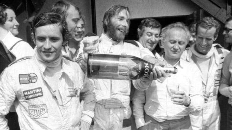 Jacky Ickx with Jurgen Barth and Hurley Haywood after winning the 1977 Le Mans 24 Hours