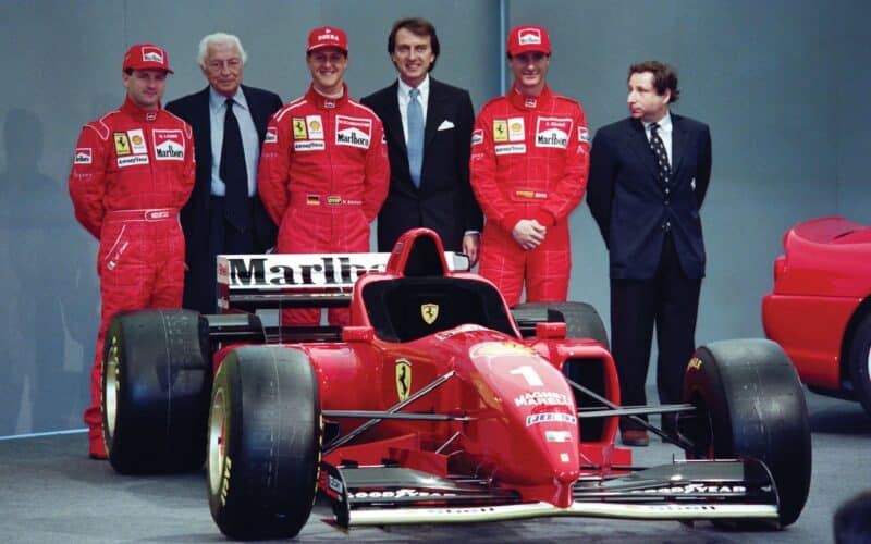 Nicola Larini, Gianni Agnelli, Michael Schumacher, Montezemolo, Eddie Irvine, Jean Todt with 1996’s Ferrari F310