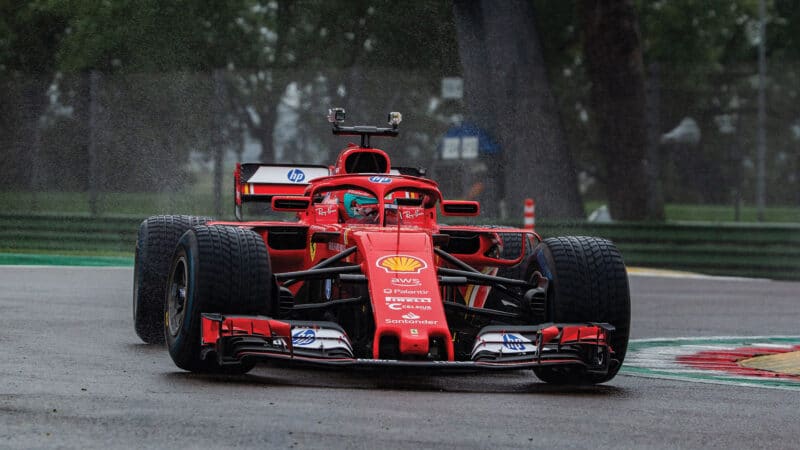 Owner drives Ferrari in the wet