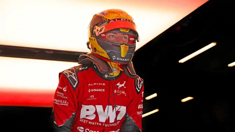 Pierre Gasly climbs into his Alpine F1 car at the 2024 Belgian Grand Prix