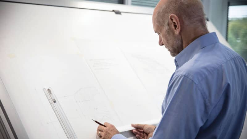 Adrian Newey on the drawing board