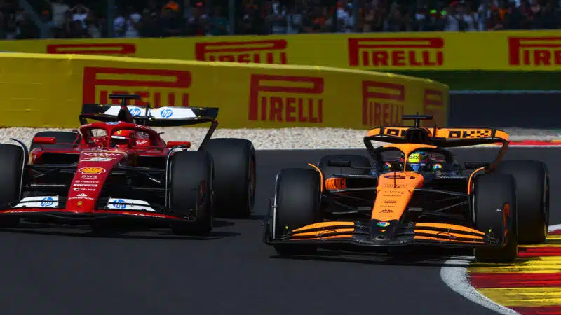 Ferrari of Charles Leclerc alongside McLaren of Iscar Piastri at 2024 F1 Belgian Grand Prix