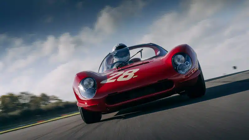 Front view of Ferrari Dino 206S on track