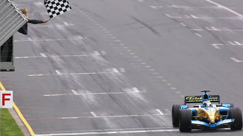 Giancarlo Fisichella takes the chequered flag to win the 2005 F1 Australian Grand Prix for Renault