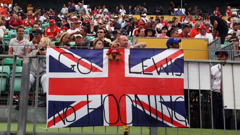 Lewis Hamilton fans with a no hooning flag at 2010 F1 Australian Grand Prix