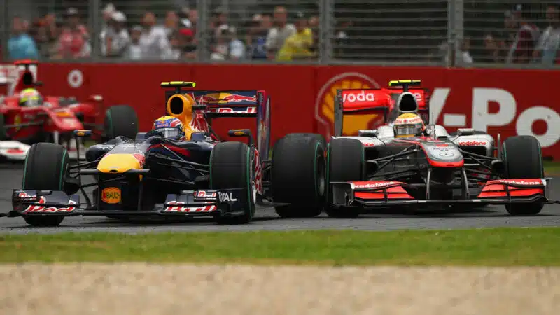 Lewis Hamilton makes contact with Mark Webber in the 2010 F1 Australian Grand Prix