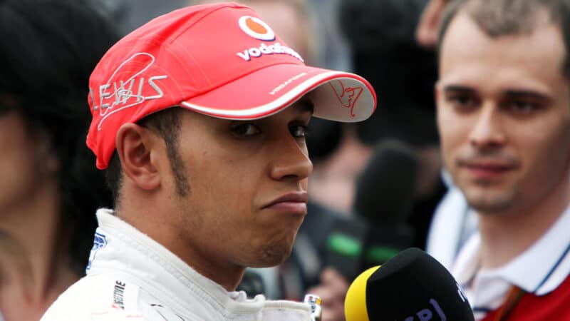 Lewis Hamilton talks to media after being stopped by police for hooning at the 2010 Australian Grand Prix