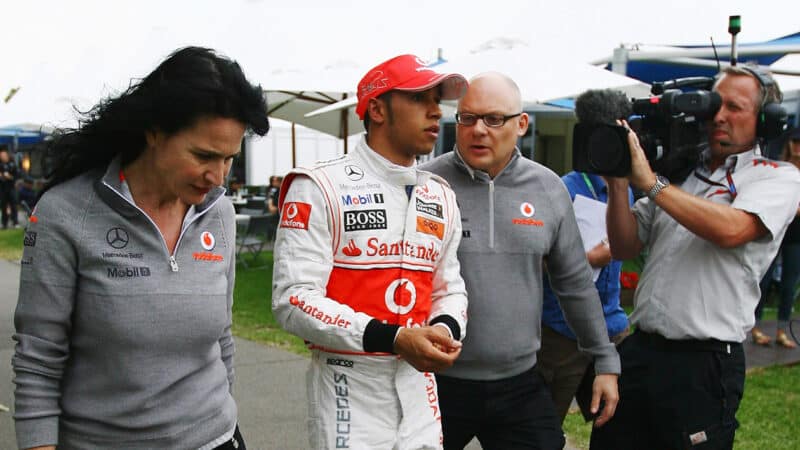 Matt Bishop escorts Lewis Hamilton through the F1 paddock at the 2010 F1 Australian Grand Prix