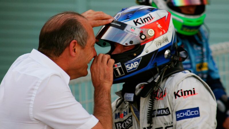 McLaren boss Ron Dennis celebrates with Kimi Raikkonen after winning the 2005 Japanese GP