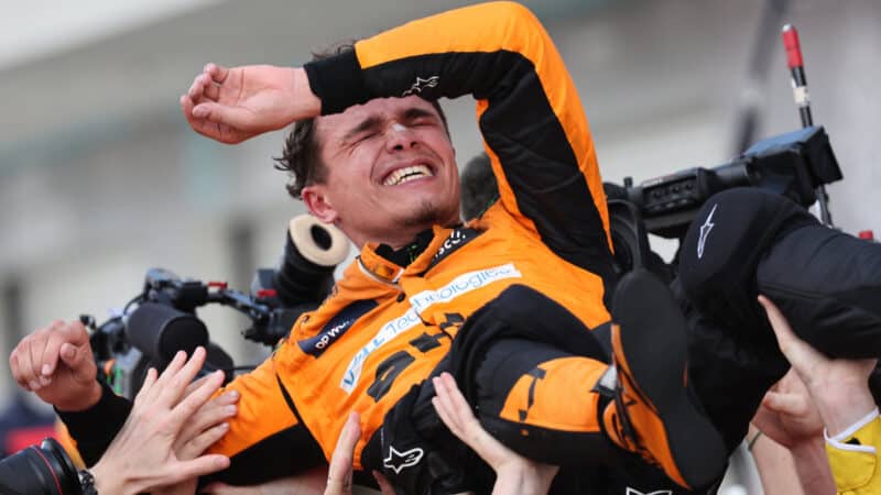 Lando Norris (McLaren-Mercedes) celebrates with mechanics after the 2024 Miami Grand Prix
