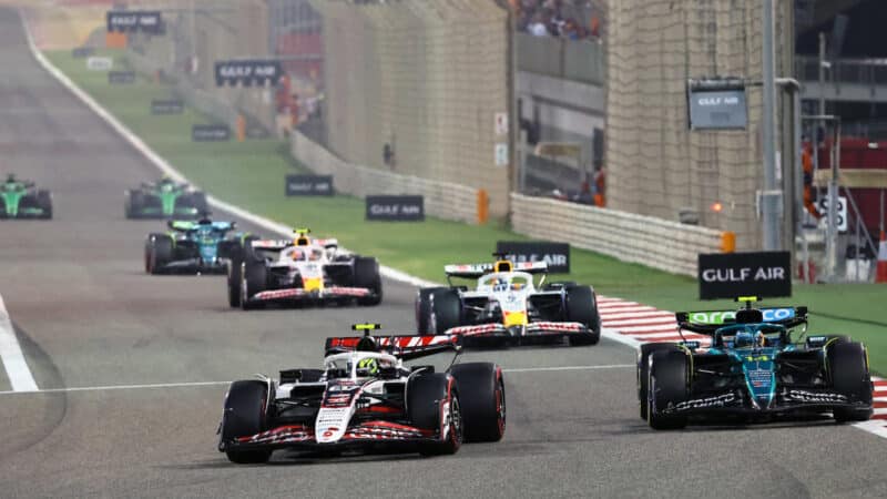 Oliver Bearman and Fernando Alonso during the 2025 Bahrain Grand Prix