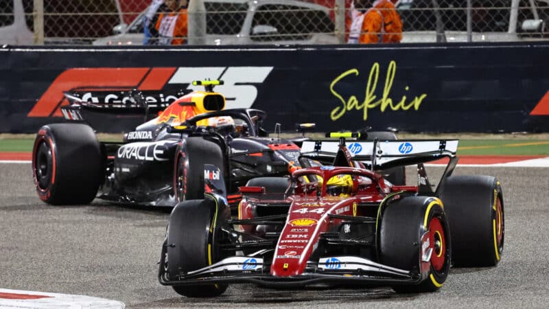 Lewis Hamilton in front of Yuki Tsunoda during the 2025 Bahrain Grand Prix