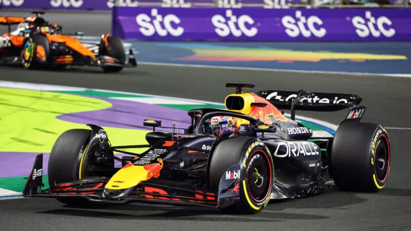 Max Verstappen (Red Bull-Honda) leads Oscar Piastri (McLaren-Mercedes) in the early stages of the 2025 Saudi Arabian Grand Prix
