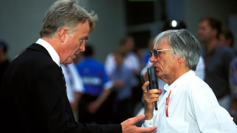 Max Mosley talks with Bernie Ecclestone in 2000