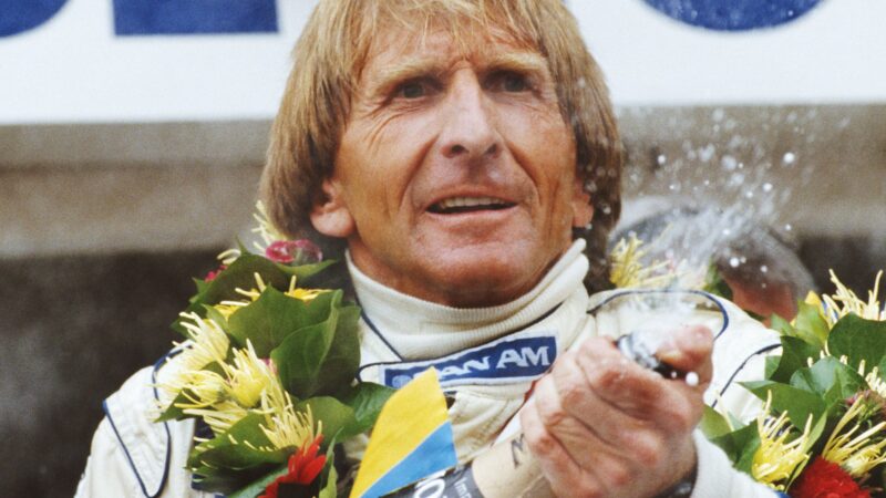 Derek Bell lets his hair down after taking his fifth and final Le Mans 24 Hours victory