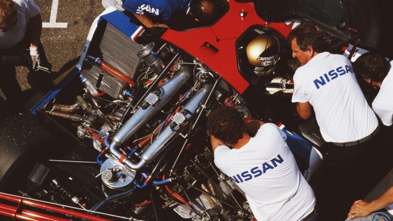 Nissan team manager Keith Greene – who passed away in 2022 – in conversation with Julian Bailey at Dijon-Prenois in 1989