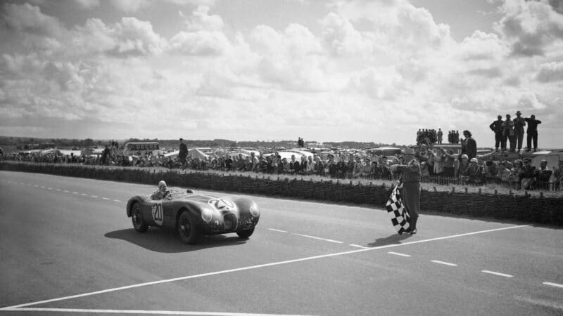 Peter Whitehead takes the flag Jaguar at Le Mans in 1951