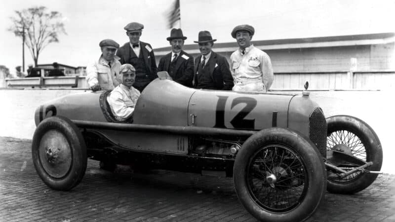 DePaolo with his Duesenberg in ’25; supercharging guru Dr Sanford Moss stands centre