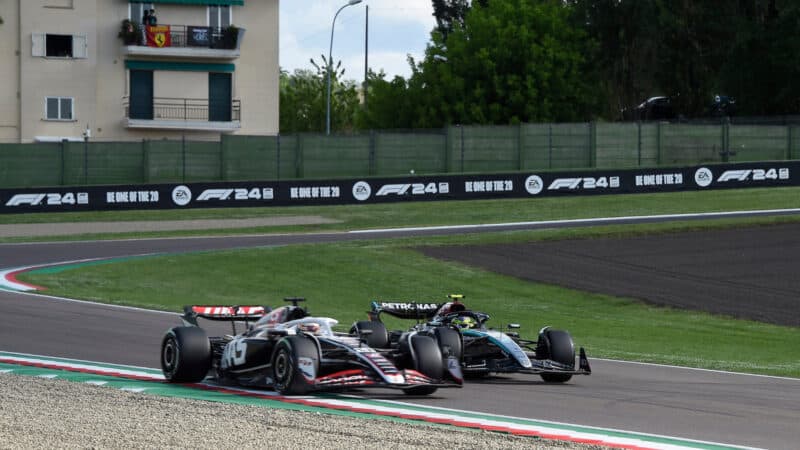 evin Magnussen (Haas-Ferrari) and Lewis Hamilton (Mercedes) during practice for the 2024 Emilia Romagna Grand Prix