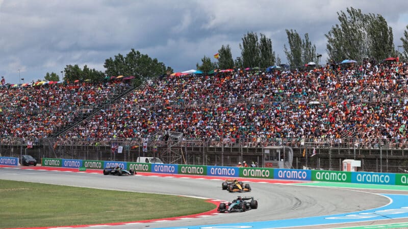 George Russell (Mercedes) leads Lando Norris (McLaren-Mercedes) and Lewis Hamilton (Mercedes) in the 2024 Spanish Grand Prix
