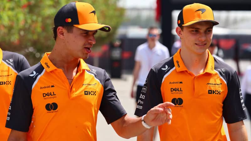 Lando Norris and Oscar Piastri (both McLaren-Mercedes) before the 2025 Bahrain Grand Prix.