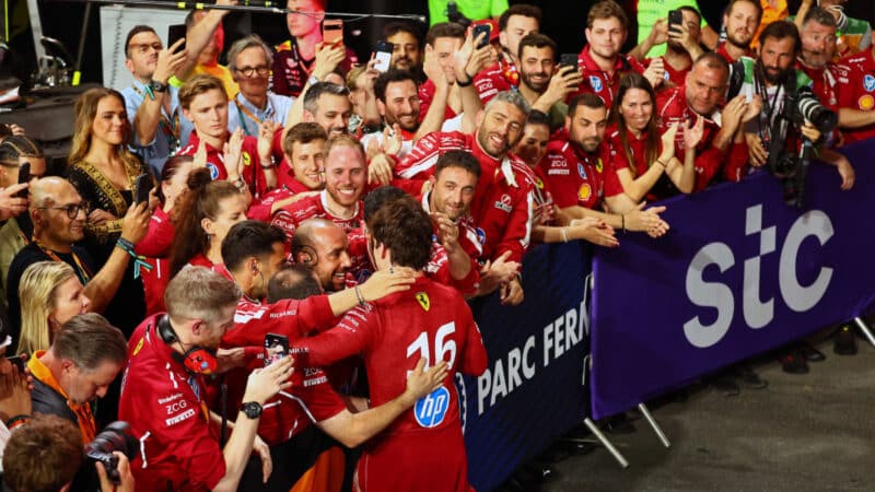 Charles Leclerc celebrate with Ferrari mechanics after the 2025 Saudi Arabian Grand Prix