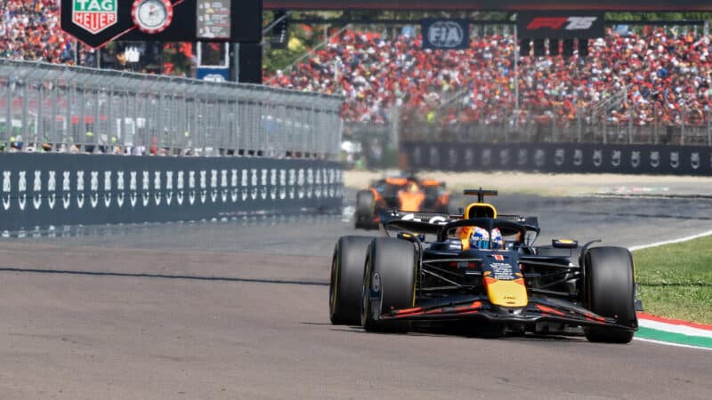 Max Verstappen (Red Bull-Honda) leads Oscar Piastri (McLaren-Mercdes) during the 2025 Emilia Romagna Grand Prix