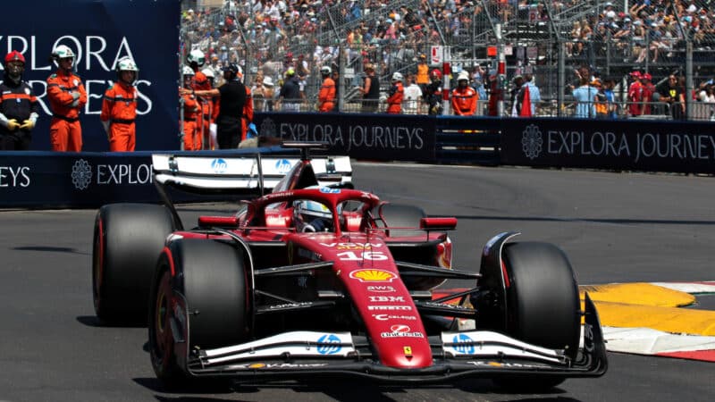 Charles Leclerc (Ferrari) with fan club flag at the 2025 Monaco Grand Prix at Monte Carlo