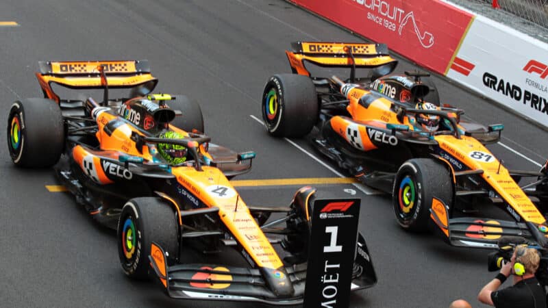 Winner Lando Norris (McLaren-Mercedes) cand Oscar Piastri still in their cars after the 2025 Monaco Grand Prix