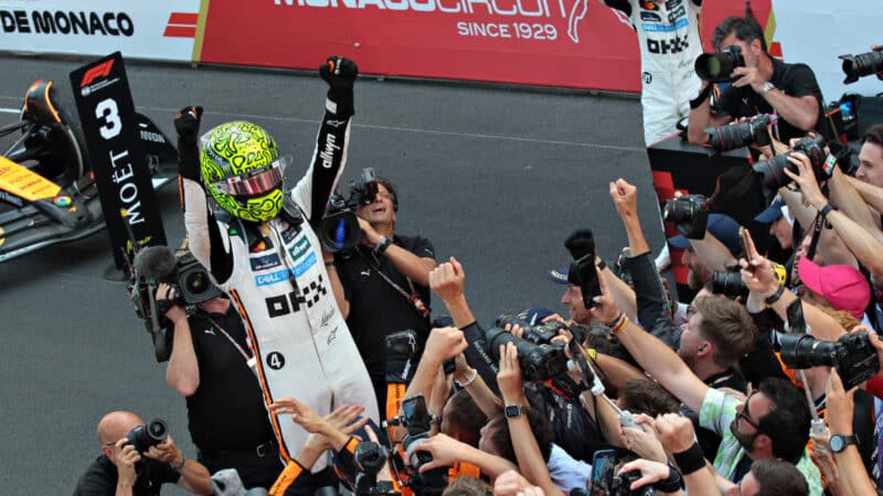 A cheering Lando Norris (McLaren-Mercedes) after winning the 2025 Monaco Grand Prix