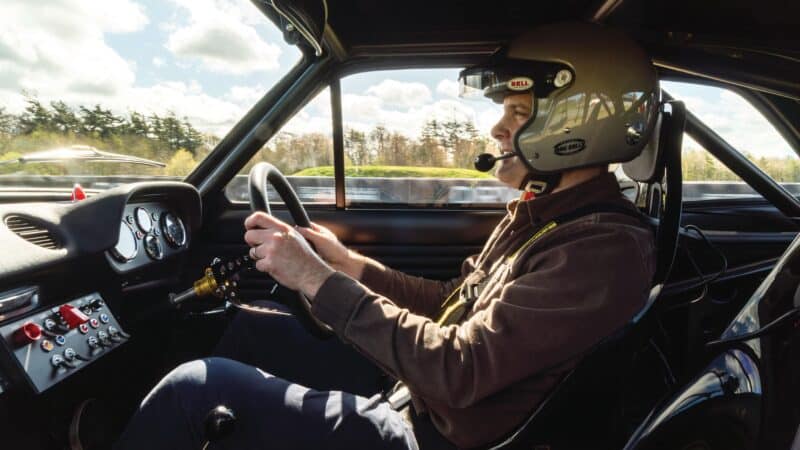 Adam Towler drives Escort Mk1 on track