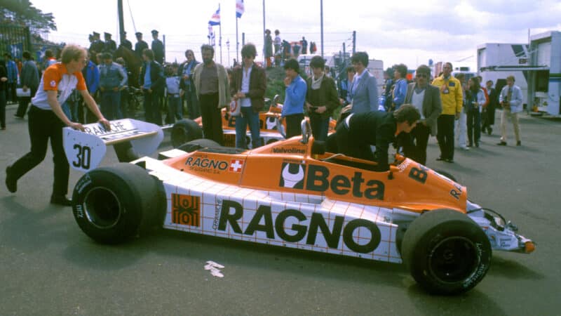 Arrows of Siegfried Stohr being pushed off the grid after a crash that injured a mechanic at the 1981 Belgian Grand Prix