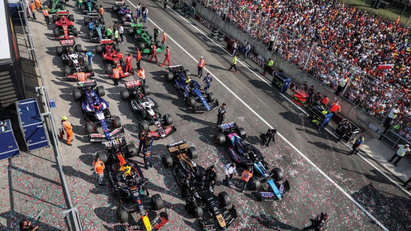 An Apex GP car, centre, front, mingles with real F1 racers at the 2024 Hungarian GP