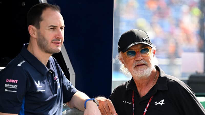 Flavio Briatore and Oliver Oakes in F1 pitlane