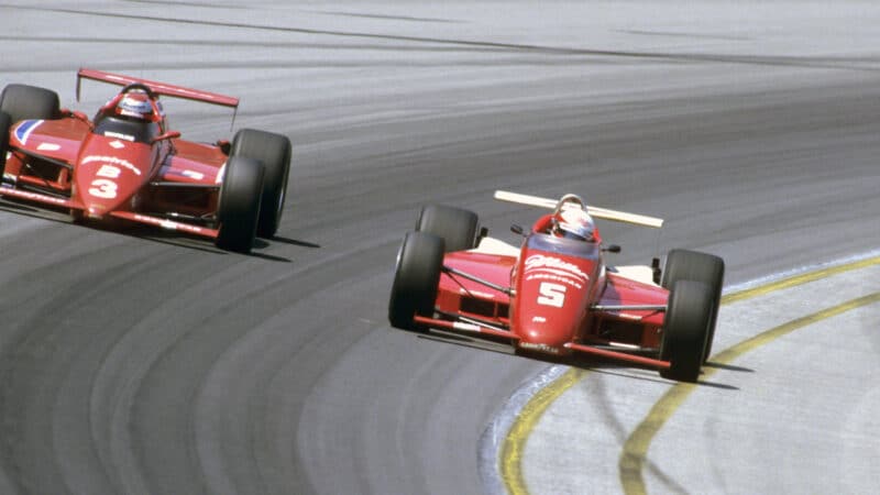 Indianapolis 500: Danny Sullivan (5) in action vs Mario Andretti (3) at Indianapolis Motor Speedway.